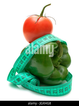 Ideal diet pair green bell peppers (bulgarian) and tomato isolated on white. Stock Photo