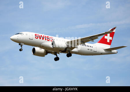 Swiss Bombardier CS100 HB-JBD landing at Heathrow Airport, UK Stock Photo