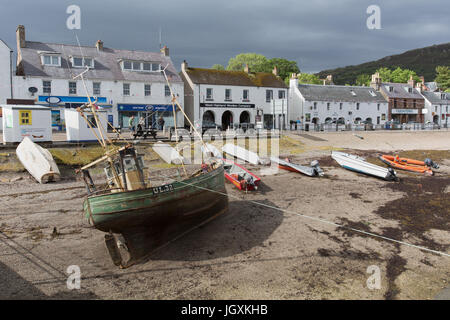 Town of Ullapool, Scotland. Picturesque view of Ullapool’s waterfront at low tide, with Shore Street in the background. Stock Photo