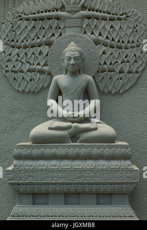 Buddha Image statue made from stone to decorate temple wall in Thailand Stock Photo
