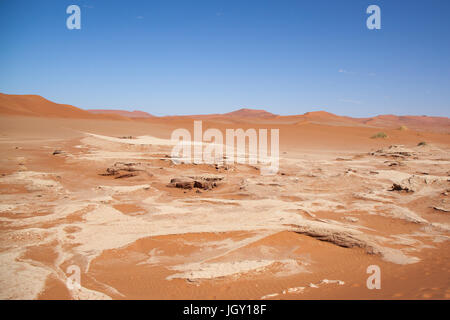 Stony Ground and Dunes in Namib Desert, Namibia Stock Photo