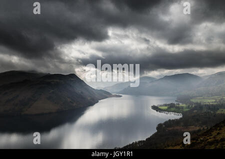 Storm clouds over Ullswater lake, seen from Gowbarrow Fell, The Lake District, UK