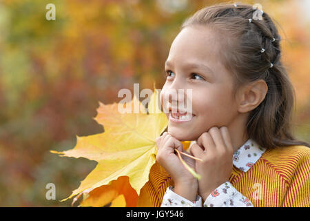 girl holding leaves Stock Photo