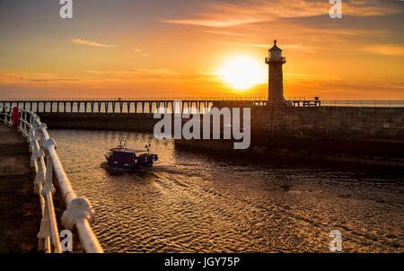 Whitby Sunrise Fishing Boat Stock Photo