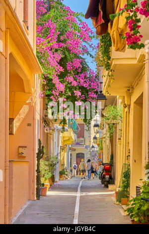 Rethymno old town street with blooming flowers decoration, Crete Island, Greece