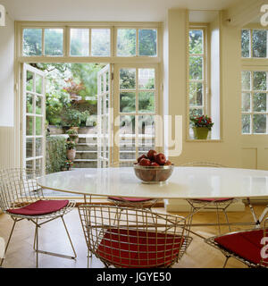 A kitchen with a wine bottle and glasses. Stock Photo