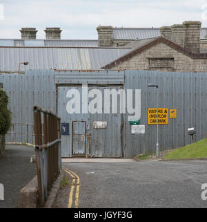 Metal security fencing surrounds HMP Dartmoor in Princetown Devon England UK Stock Photo
