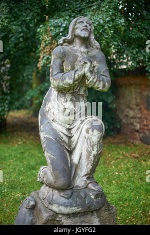 Statue of Jesus praying in the courtyard of St. Anne's Church Zabkowice Slaskie Lower Silesia Poland Stock Photo