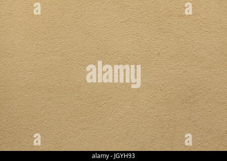 Yellow ochre painted stucco wall. Background texture. Stock Photo