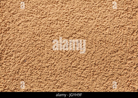 Orange painted stucco wall. Background texture. Stock Photo