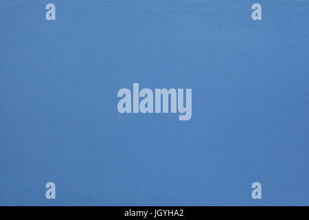 Blue painted stucco wall. Background texture. Stock Photo
