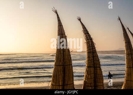 Huanchaco Beach and the traditional reed boats (caballitos de totora) - Trujillo, Peru Stock Photo