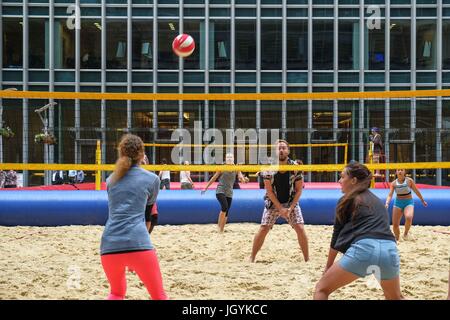 London, UK. 11th July, 2017. Action for Kids Charity work with young people with learning disabilities from the age of 14 with their transition to adulthood and to help them prepare for work. The volleyball match is made up of bartenders from different bars around London. Credit: Claire Doherty/Pacific Press/Alamy Live News Stock Photo