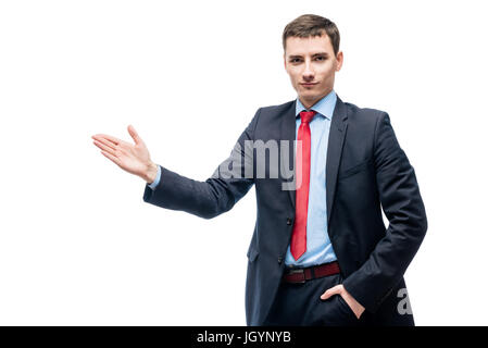 Young businessman showing his hand on something on a white background Stock Photo