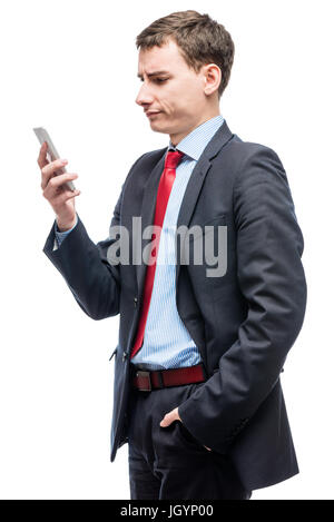 Pensive boss with phone in hand on white background Stock Photo