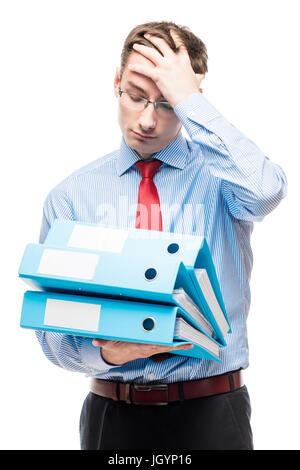 Tired and frustrated chief accountant with documents in the reporting period on a white background Stock Photo