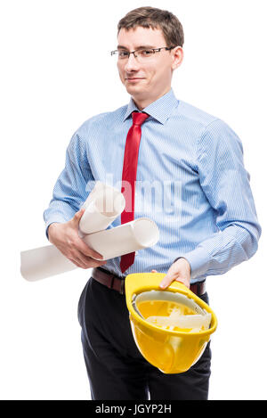 Portrait of a male architect with drawings and a helmet Stock Photo