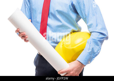Hands of a businessman with a helmet and blueprints, close-up Stock Photo