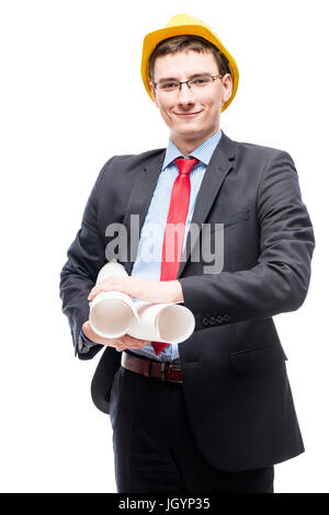 Boss in suit and yellow helmet with blueprints on white background Stock Photo