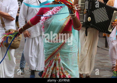 ISKCON devotees performing a harinam (devotional walk with dancing and chanting) in Paris. France. Stock Photo