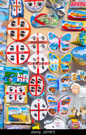 Sardinia souvenirs, a display of colourful souvenirs on sale outside a shop in the old town quarter of Alghero, Sardinia. Stock Photo