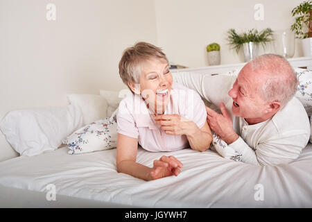 Seniors with humor laughing and having fun Stock Photo
