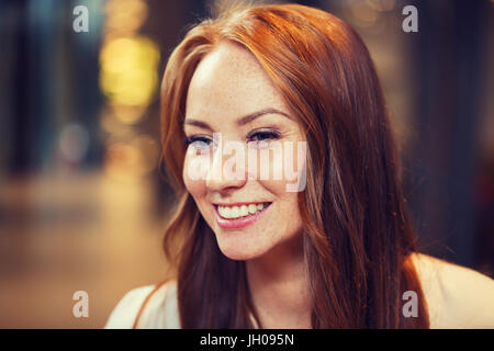 smiling happy young redhead woman face Stock Photo