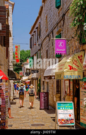 Shoppers in the alleyways of Trogir, Croatia. Stock Photo