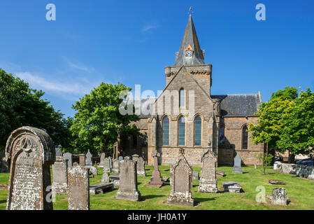 Old tombstones at cemetery of the 13th century Dornoch Cathedral, parish church in the Church of Scotland, Sutherland, Scottish Highlands, Scotland Stock Photo