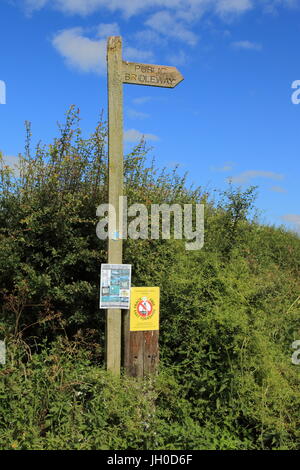 Anti fracking signs on a footpath sign on the Yorkshire wolds in East Yorkshire. Stock Photo