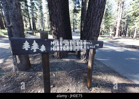 A sign directs hikers to the Mill City Stampmill, a gold processing mill built by miners who first settled in Mammoth Lakes in the 1870s Stock Photo