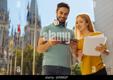 Two right people discussing their venture informally Stock Photo