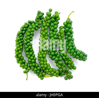 Fresh piper nigrum isolated on a white background, green peppercorns Stock Photo