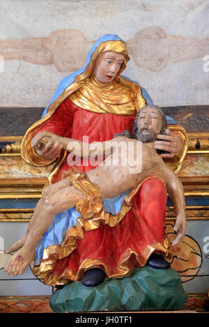 Pratz baroque chapel. Painted wood Pieta.  France. Stock Photo