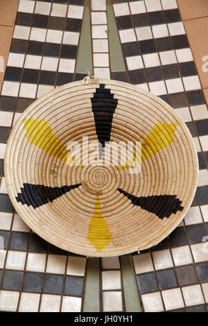 Namugongo catholic martyrs' shrine, Kampala. Basket for offerings. Uganda. Stock Photo