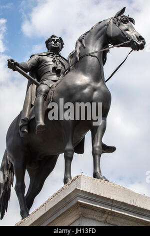 A statue of King George IV located in Trafalgar Square, London, UK. Stock Photo