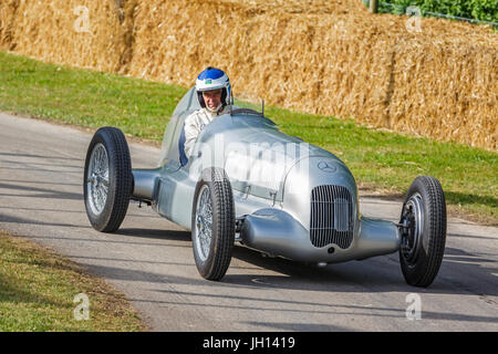 1934 Mercedes-Benz W25 with driver Roland Asch at the 2017 Goodwood Festival of Speed, Sussex, UK. Stock Photo