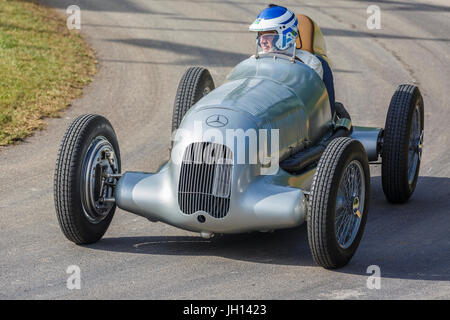 1934 Mercedes-Benz W25 with driver Roland Asch at the 2017 Goodwood Festival of Speed, Sussex, UK. Stock Photo