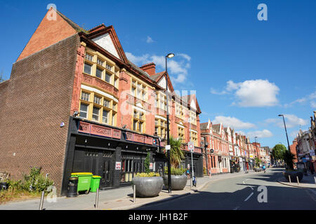 Bridge Street in the Cheshire town of Warrington. The main street in the town of Warrington which runs from the town centre. Stock Photo