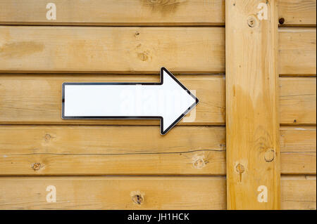 White pointer without text on a wooden wall Stock Photo