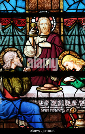 Moulins cathedral. Stained glass window. The Last Supper is the final meal that Jesus shared with his Apostles in Jerusalem.  Moulins. France. Stock Photo