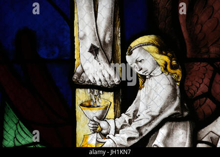 Moulins cathedral. Stained glass window. Jesus on the cross. Close-up. Moulins. France. Stock Photo