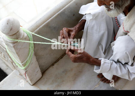 Ajmer Sharif dargah, Rajasthan. Muslim holding prayer beads. India. Stock Photo