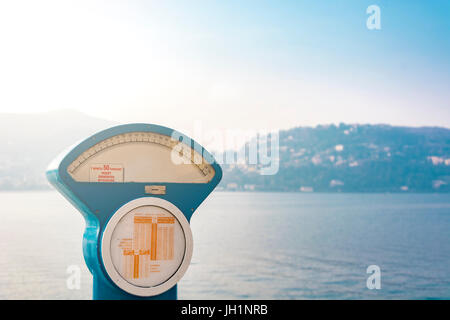 large analog scale with the lake of Como in the background Stock Photo