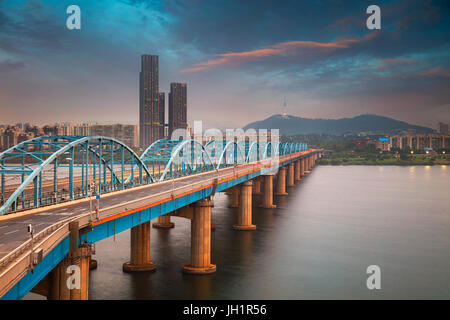 Seoul. Image of Seoul, South Korea with Dongjak Bridge and Hangang river at sunset. Stock Photo