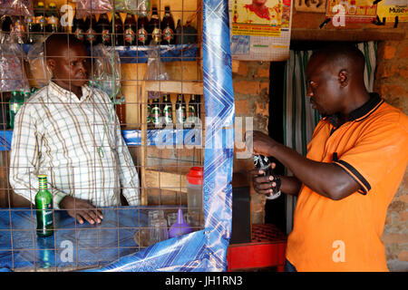 Bartender and client. Uganda. Stock Photo
