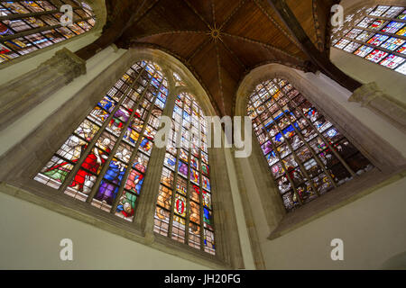 OLD CHURCH OR DE OUDE KERK, AMSTERDAM, THE NETHERLANDS - JULI 7, 2017: Famous stained glass windows in the Maria Chapel. Stock Photo