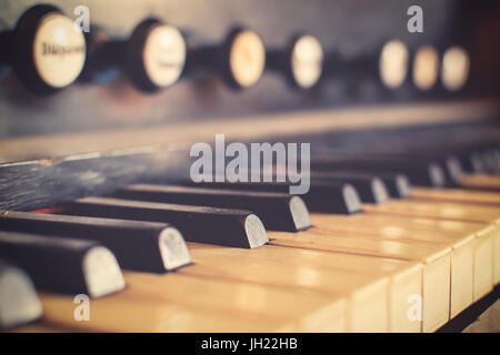 old styled and retro vintage harpsichord as background - very low DOF. Stock Photo