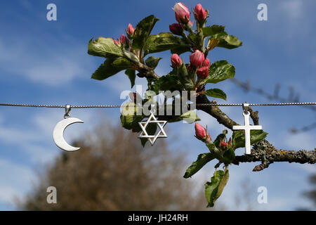 Symbols of islam, judaism and christianity. Stock Photo