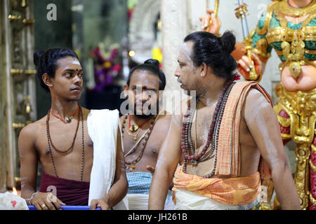 Sri Veeramakaliamman Hindu Temple.  Hindu Brahmin priests.   Singapore. Stock Photo